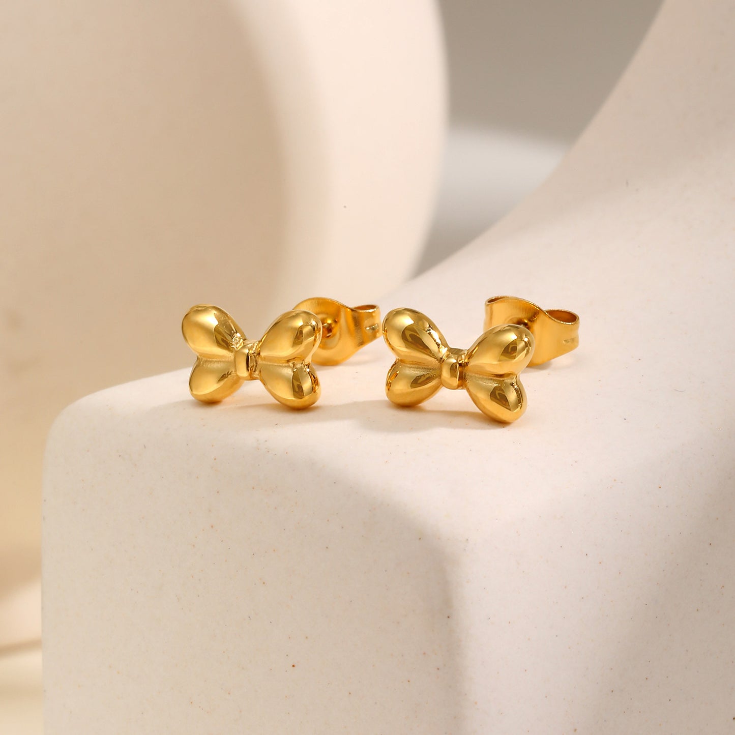 J489 Aretes moño acero inoxidable 1cm