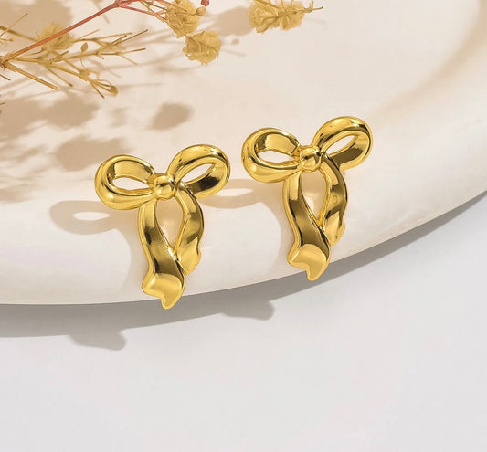 E5774 Aretes moño dorado acero inoxidable 4cm