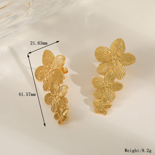 E3727 Aretes flor dorada acero inoxidable chapado en oro de 18k 4cm