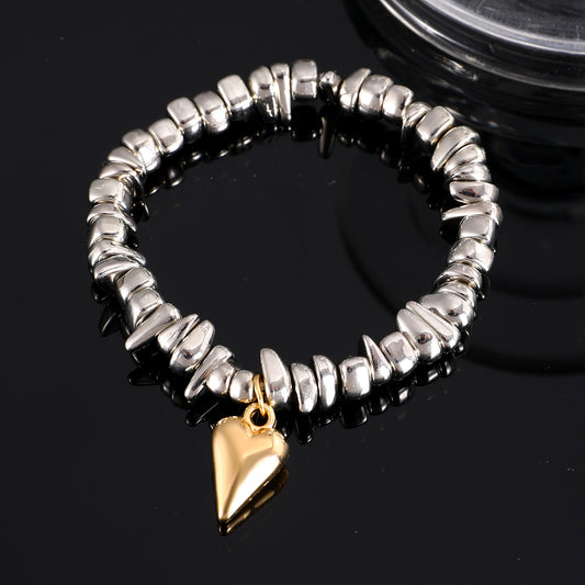 B458 pulsera corazón dorado plateada cobre