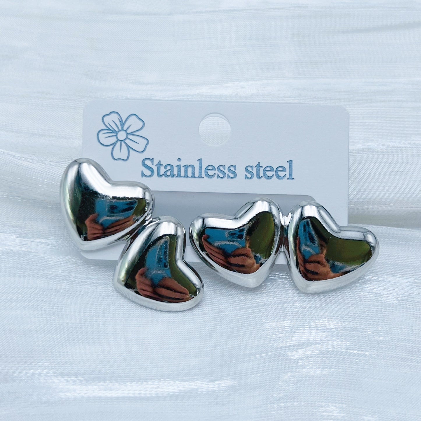 E7285 Aretes corazon plateados acero inoxidable 2cm