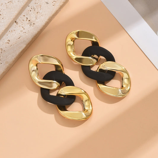 E7149 Aretes geométricos dorados con negro  aleacion 8cm