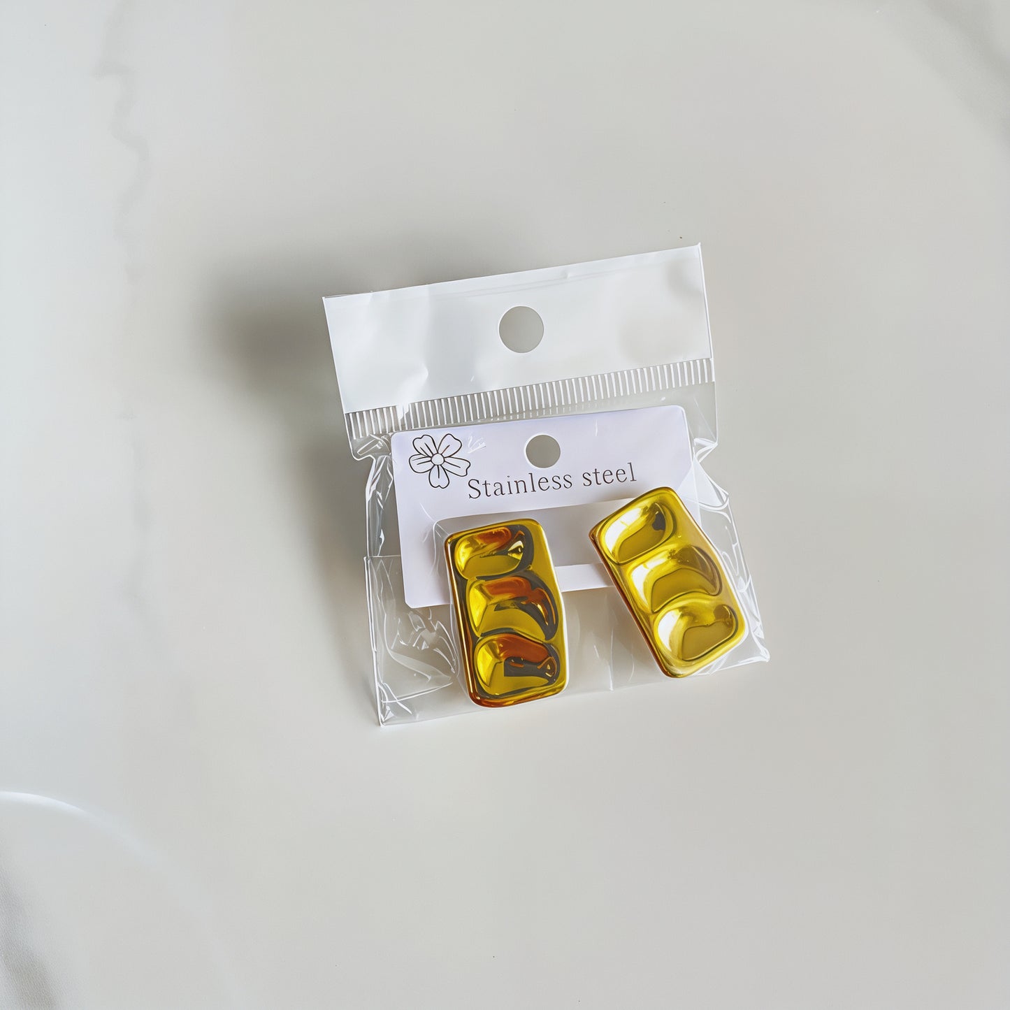 E5065 Aretes rectangulares dorados acero inoxidable 3cm