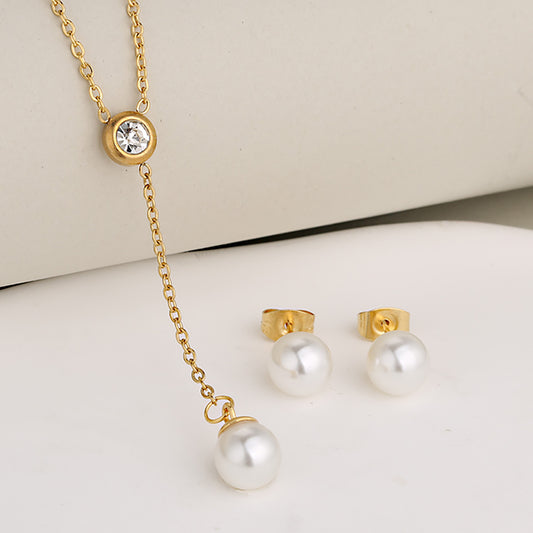 C951 Conjunto de aretes y collar perla dorado acero inoxidable 25cm largo