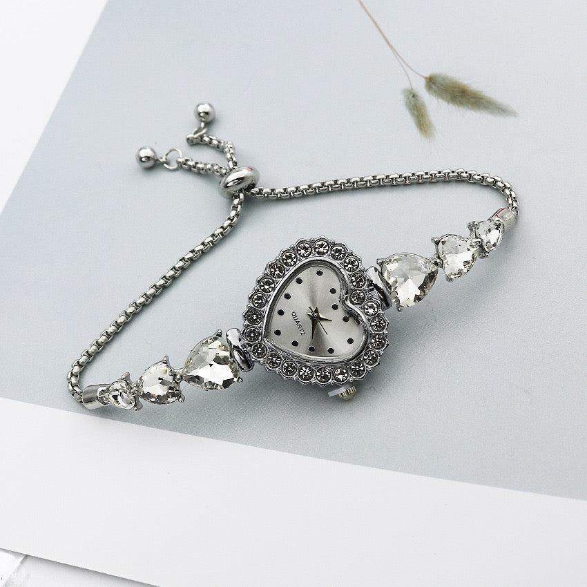 R176 reloj corazón plateado brillante ajustable