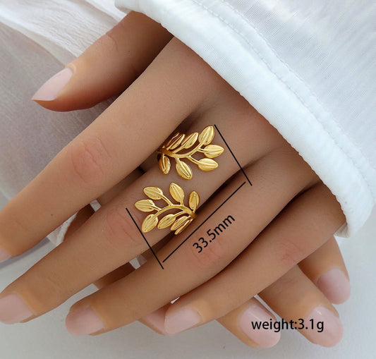 A540 anillo flores doradas acero inoxidable abierto
