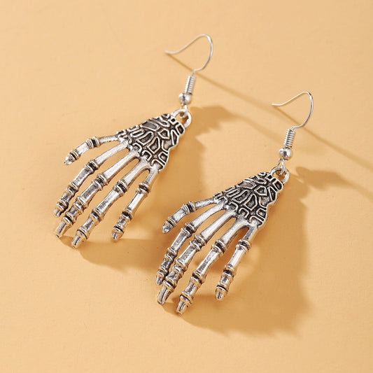 E4047 Aretes mano de esqueleto aleacion 7cm