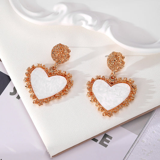243 aretes corazón blanco aleacion