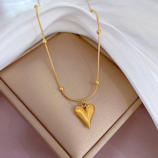 C574 Collar corazon acero de titanio largo 22cm dije 2cm