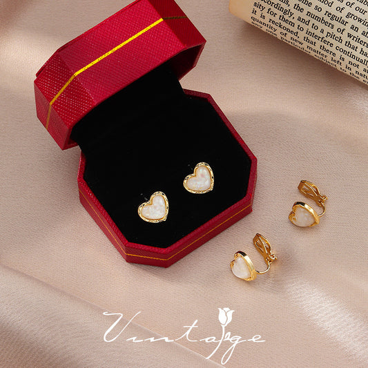 E3550 Aretes corazón blanco aleacion 1cm