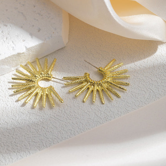 E5882 Aretes destellos dorados aleacion 5cm