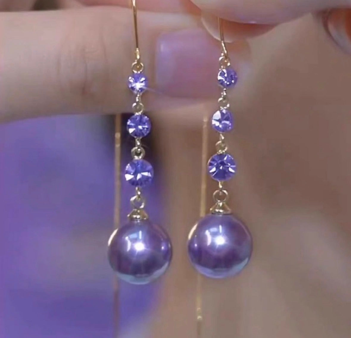 E7047 Aretes perlas moradas aleacion 7cm