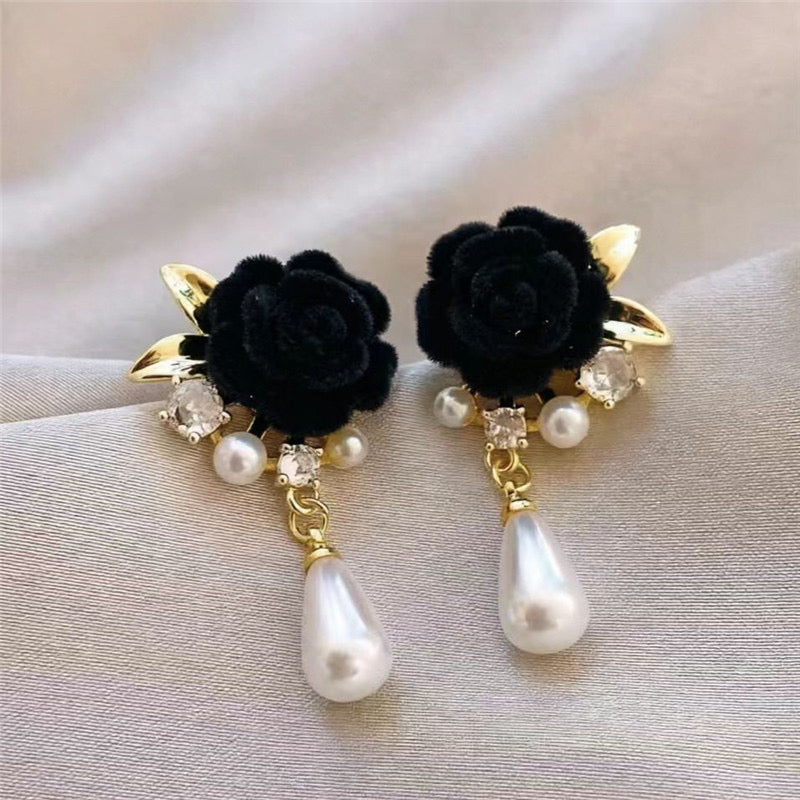 E7300 Aretes flor negra gamuza aleacion 4cm