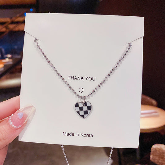 C1153 Collar plateado corazón cuidados blancos y negro acero inoxidable