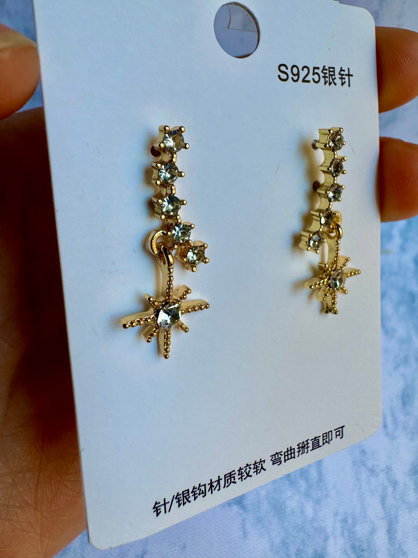 E185 Aretes estrellas incrustación cristal poste de plata 2.5cm