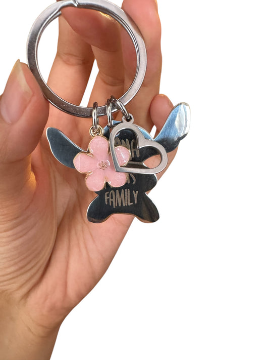 KST LLavero stitch Ohana means family “ acero inoxidable flor rosa