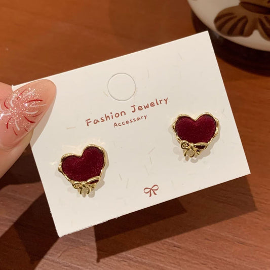 E3374 Aretes corazon gamuza dorado 1.3cm