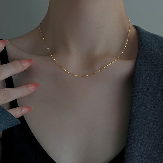 C523 Collar dorado acero de titanio largo 23cm