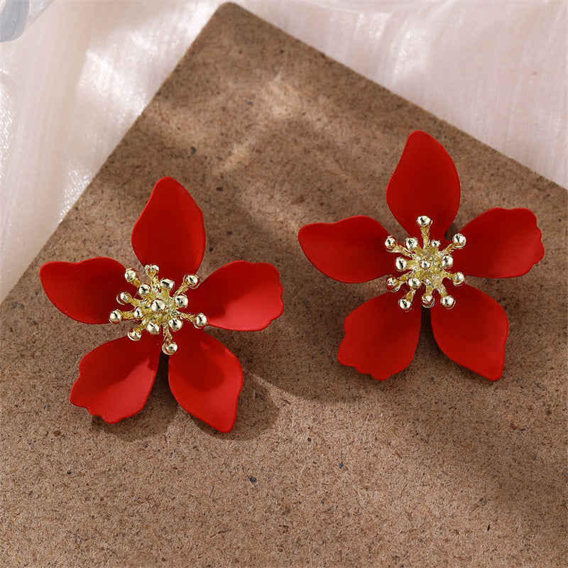 E7228 Aretes flor roja esmaltada metal 3cm