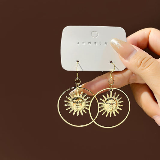 E3480 Aretes colgantes sol aleacion 5cm