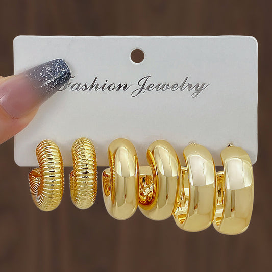 J591 Conjunto de aretes cobre 4cm