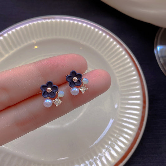 E3848 Aretes flor azul metal 1cm
