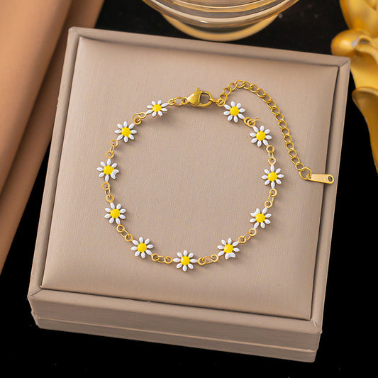 B672 Pulsera flores blancas acero titanio 20cm