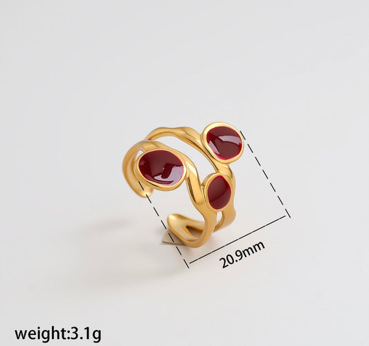 A554 Anillo dorado con rojo acero inoxidable abierto