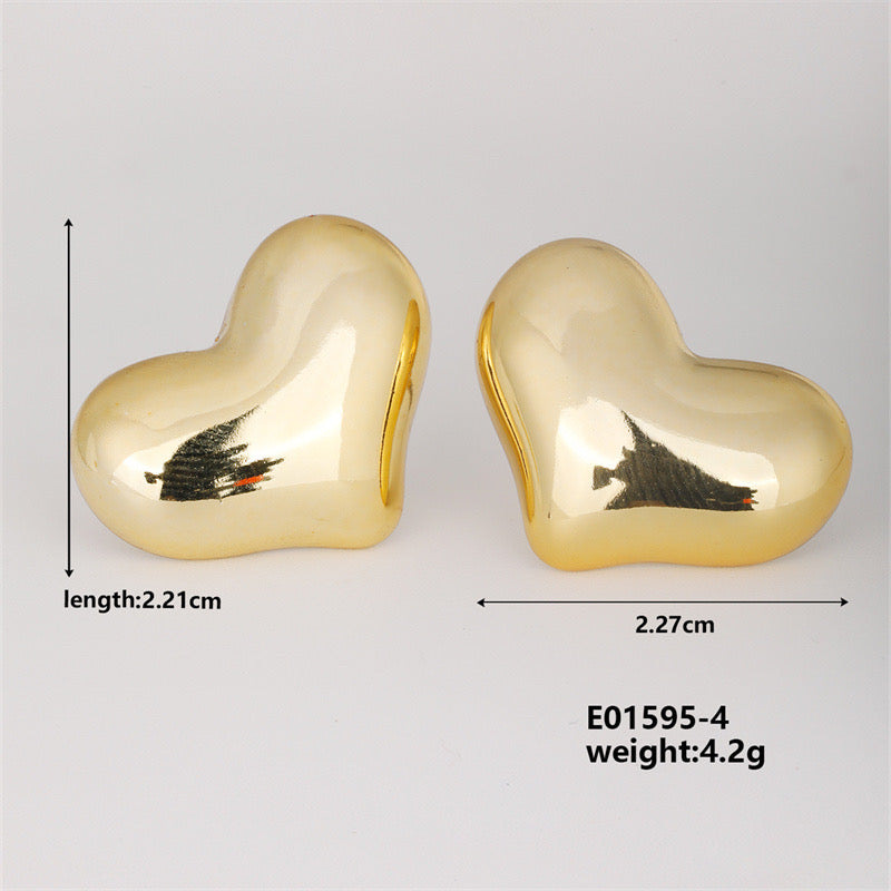 E3721 Aretes corazón dorado cobre 2cm