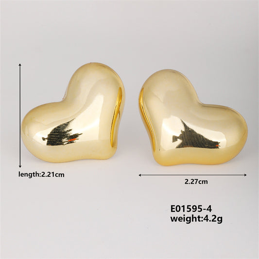 E3721 Aretes corazón dorado cobre 2cm