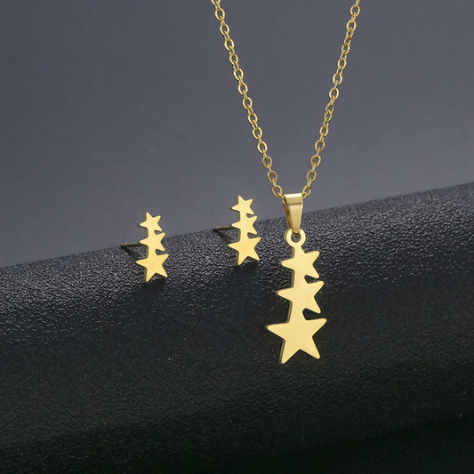 C1114 conjunto de collar y aretes estrellas doradas acero inoxidable