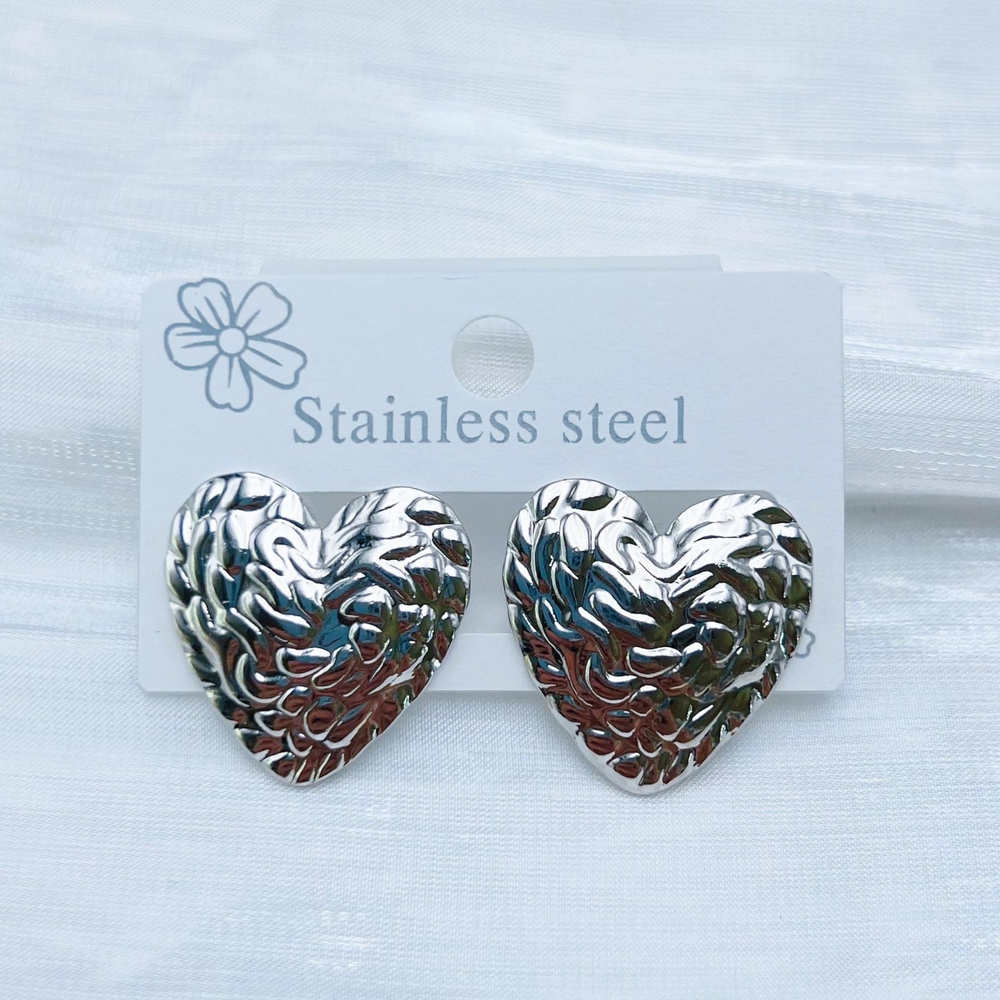 E7286 Aretes corazon plateados acero inoxidable 2cm