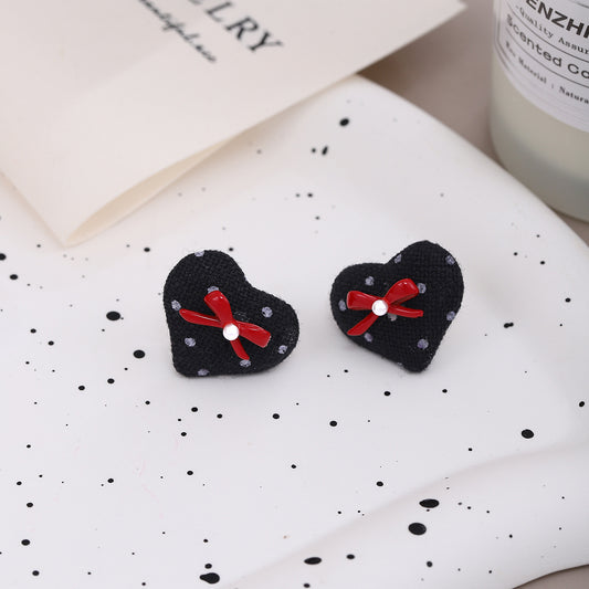E2528 Aretes corazon moño forrado tela 2cm
