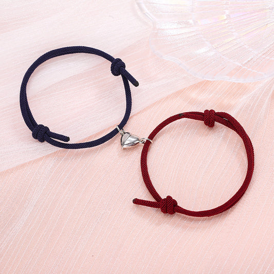 B147 Duo pulseras pareja tela corazon iman enamorados