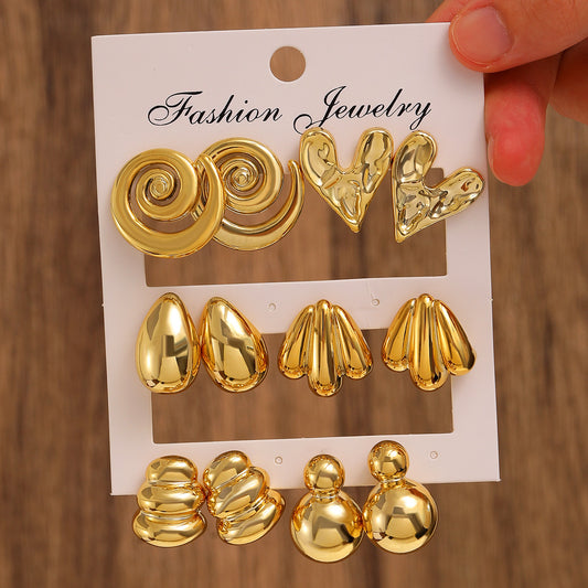 E5844 Conjunto aretes dorados caracol, corazon y gotas doradas chapados en oro de 14k 4cm aleacion