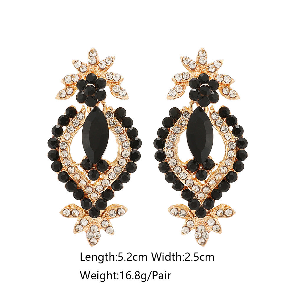 E6078 Aretes elegante negro dorado 5cm aleacion