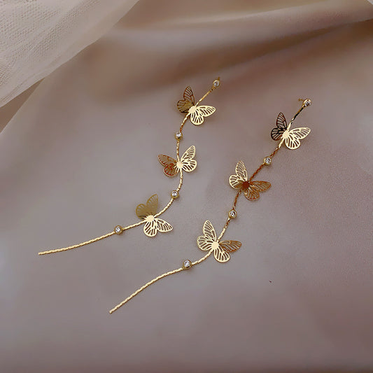 E5063 Aretes mariposas colgantes doradas aleacion 6cm