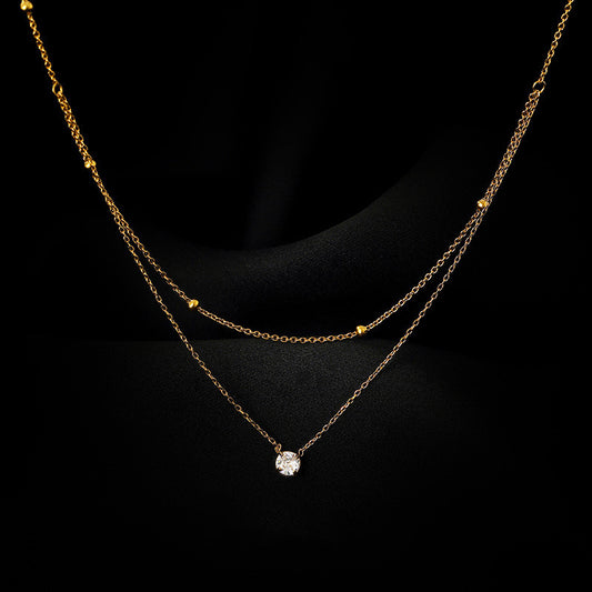 C1533 Collar dorado doble cristal acero de titanio 24cm