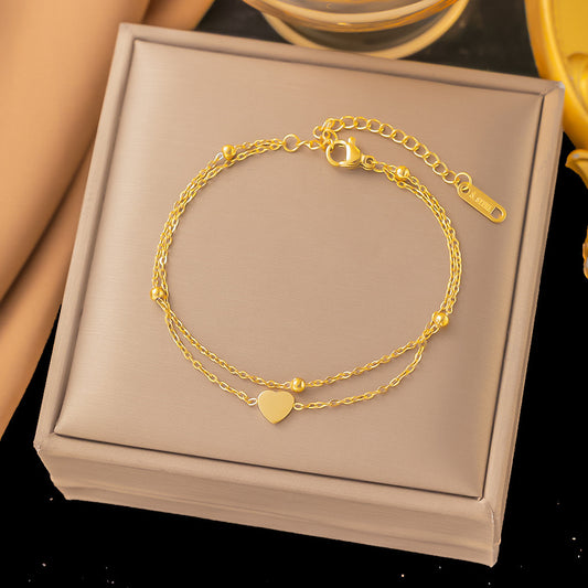 B498 pulsera corazón dorado acero titanio 21cm