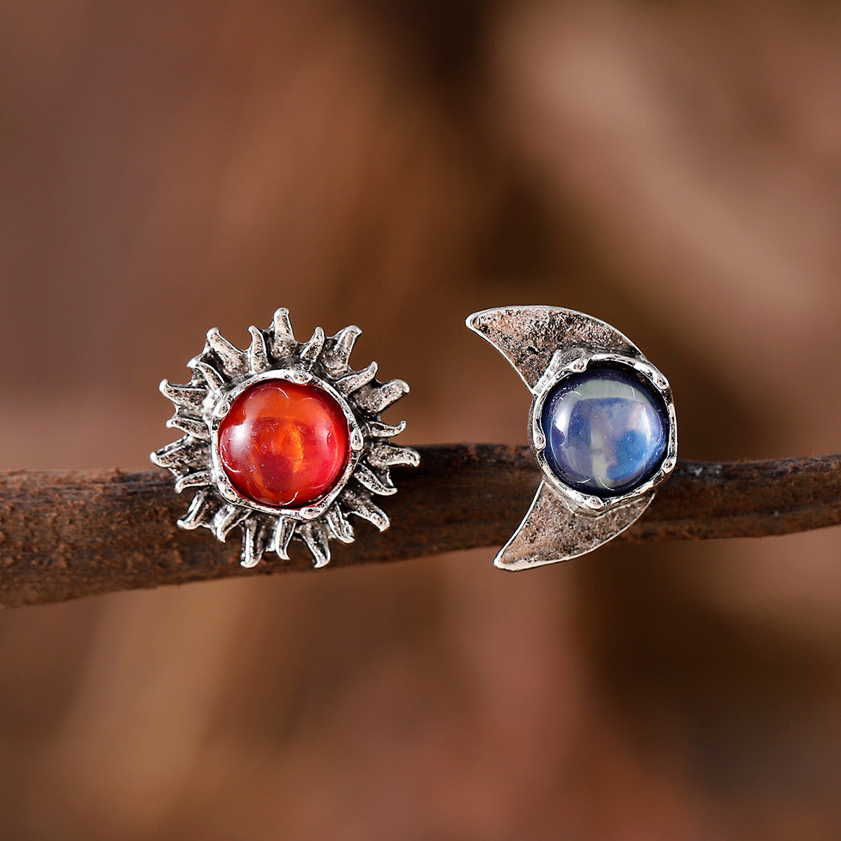 E5930 Aretes asimetricos luna y sol acero inoxidable 1.5cm