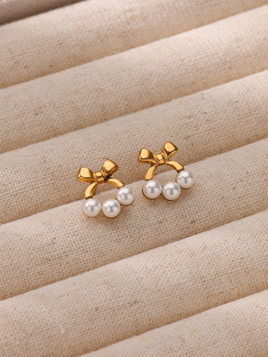 E3648 Aretes perla moño acero inoxidable 1cm