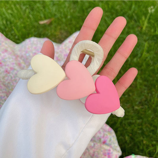 AC196 Pinza corazones resina 12cm