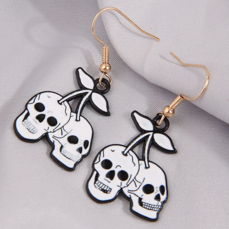 H68 Aretes craneo 5cm de aleacion
