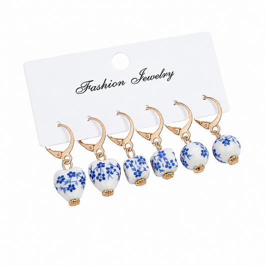 E2622 Conjunto 3 pares aretes argolla ceramica y aleacion