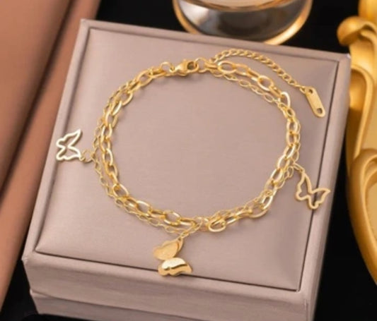 J554 Pulsera dorada mariposas acero de titanio 22cm
