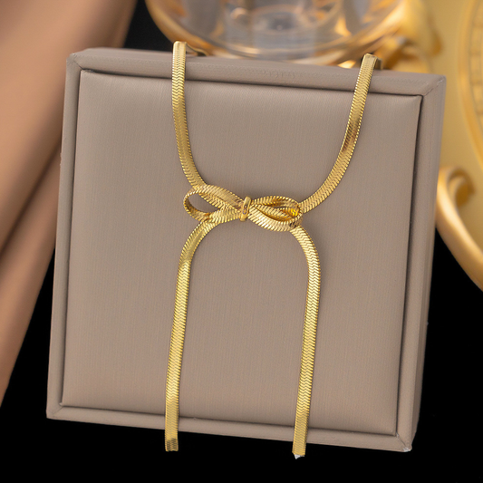J537 Collar moño dorado elegante acero de titanio largo 15cm